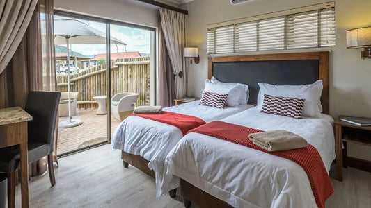 🌿 Twin Room with Patio – The Kingdom Resort