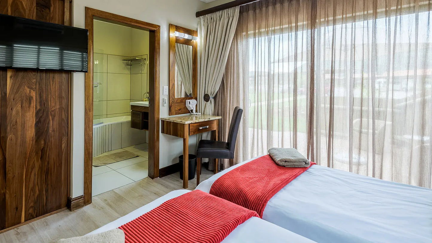 🌿 Twin Room with Patio – The Kingdom Resort