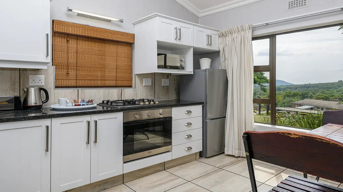 🌿 Two Bedroom Chalet with Patio – Hazyview Cabanas