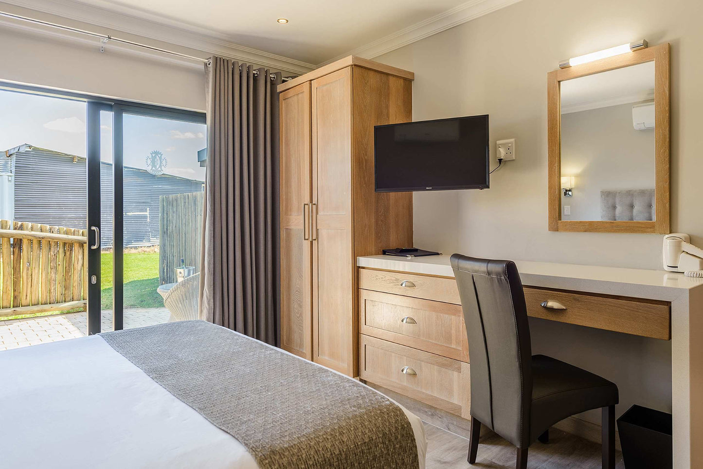 🌿 Double Room with Patio – The Kingdom Resort